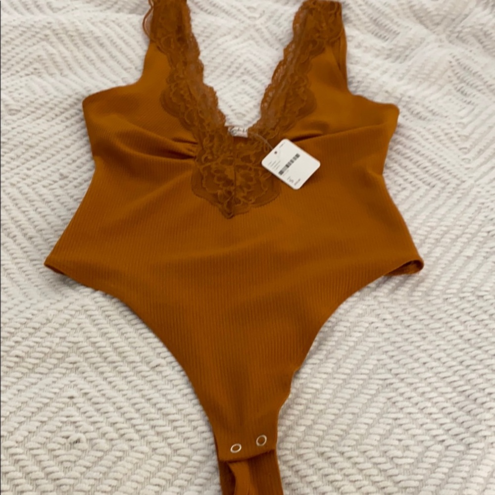 FREE PEOPLE: Mustard/ yellow lace bodysuit